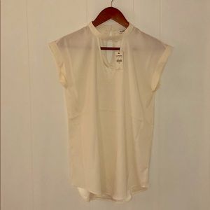 Express cream blouse with V neck cut out detail